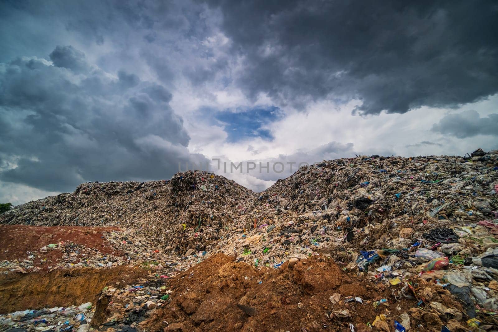 Garbage Dump Hill, landscape with landfill and clouds