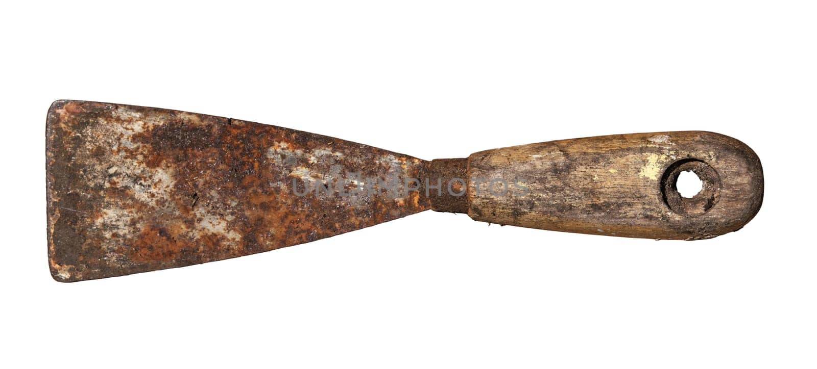 An old rusty and dirty putty knife isolated