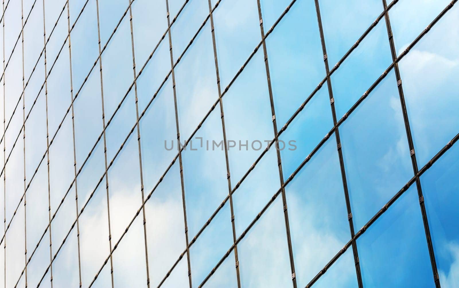 Windows of modern office building. Industrial architectural background.