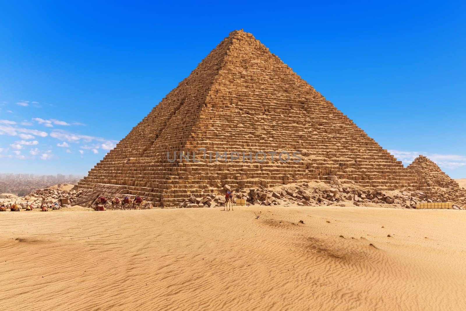 The Pyramid of Menkaure and the blue sky of Giza, Egypt.