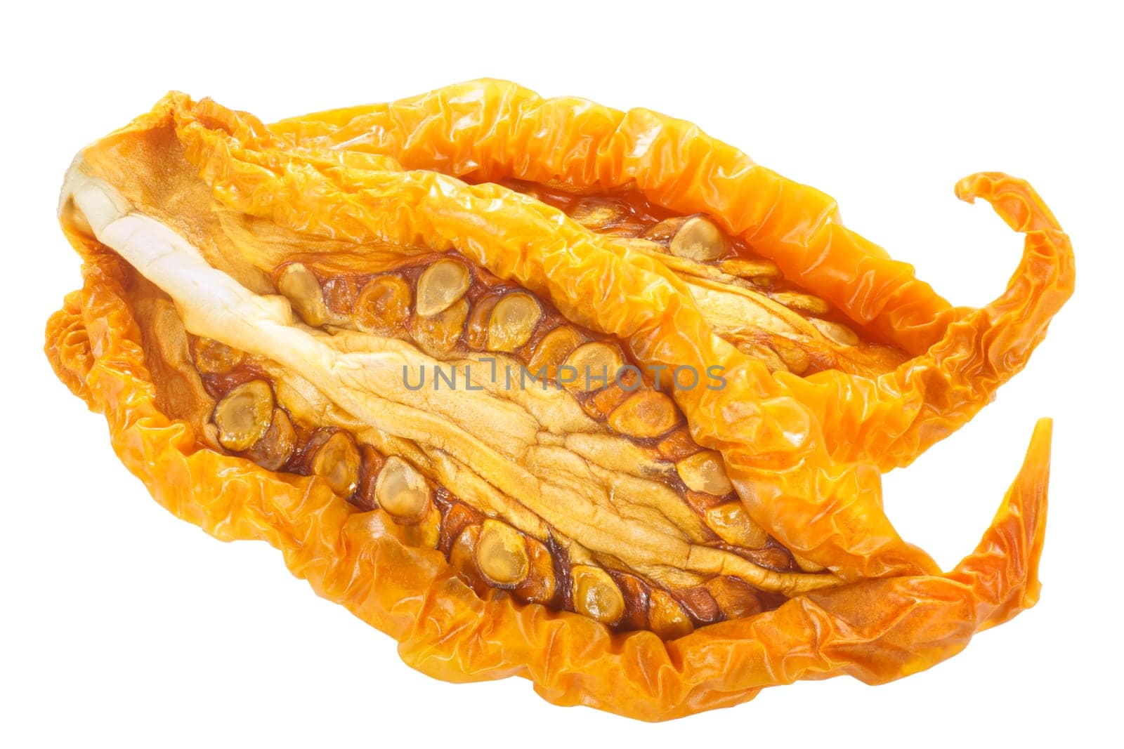 Sundried or dried yellow oblong tomato halves, isolated