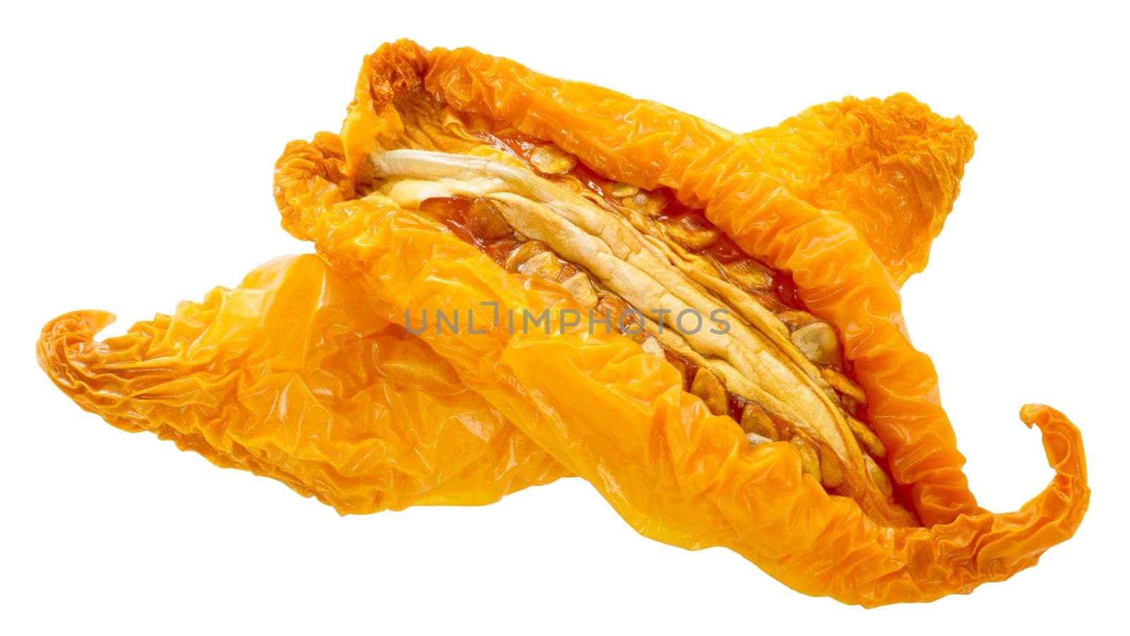 Sundried or dried yellow oblong tomato halves, isolated
