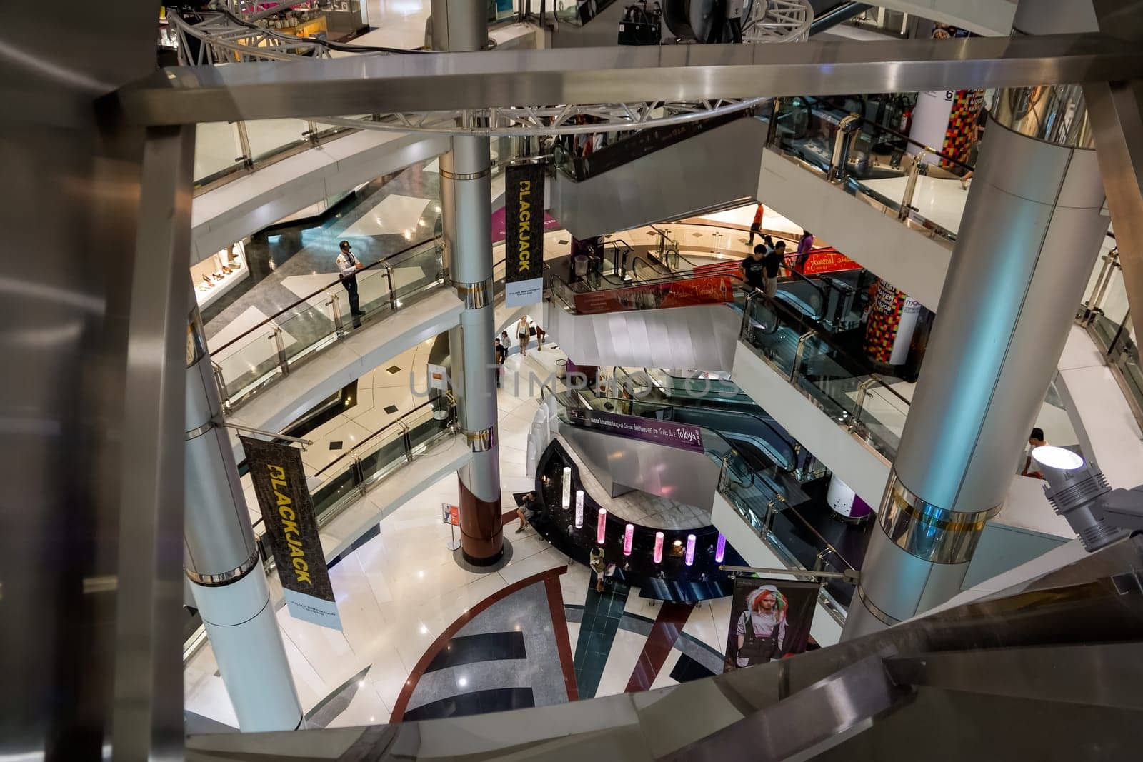 Bangkok, Thailand, March 2013 Modern interior of Siam Shopping Mall. Siam is one of the most popular shopping centers in Bangkok also has Madame Tusnads wax museum, Ocean World and cinema complex