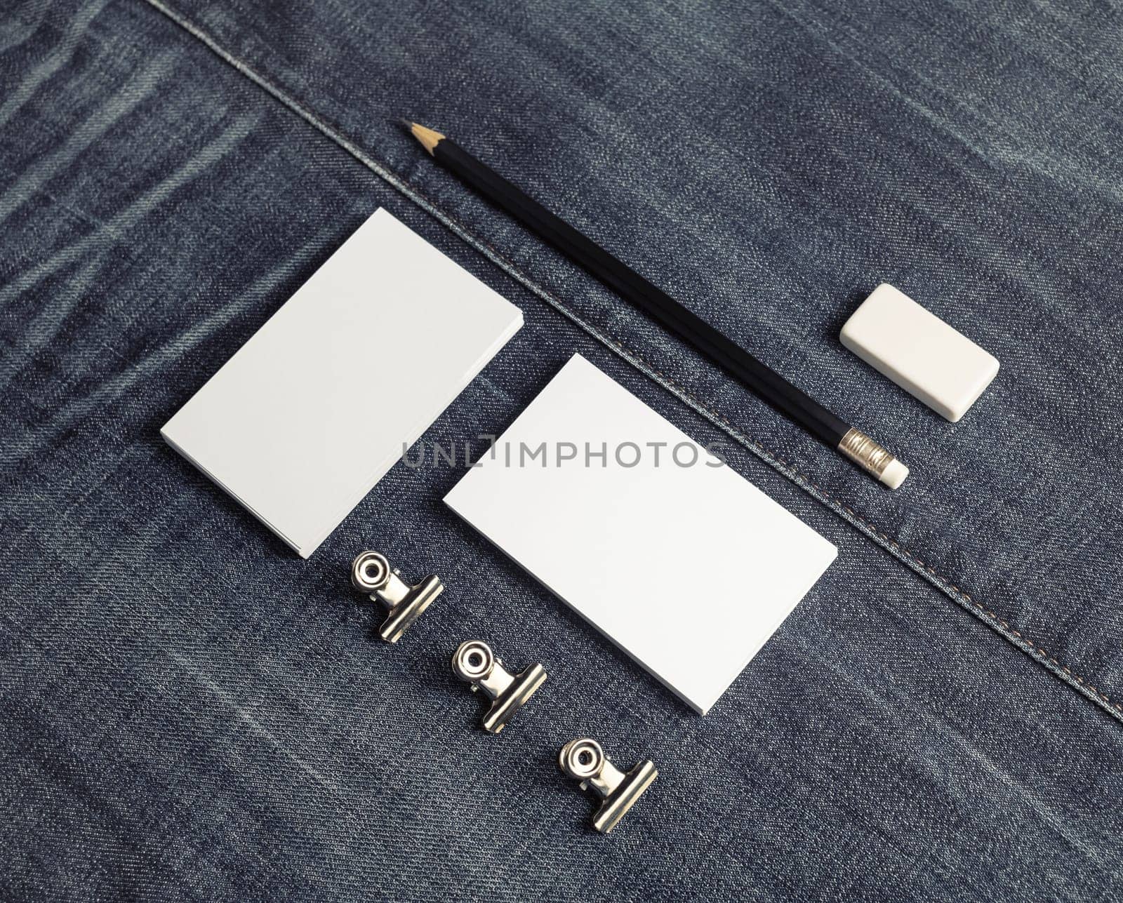 Blank business stationery set on denim background. Copy space for placing your design.