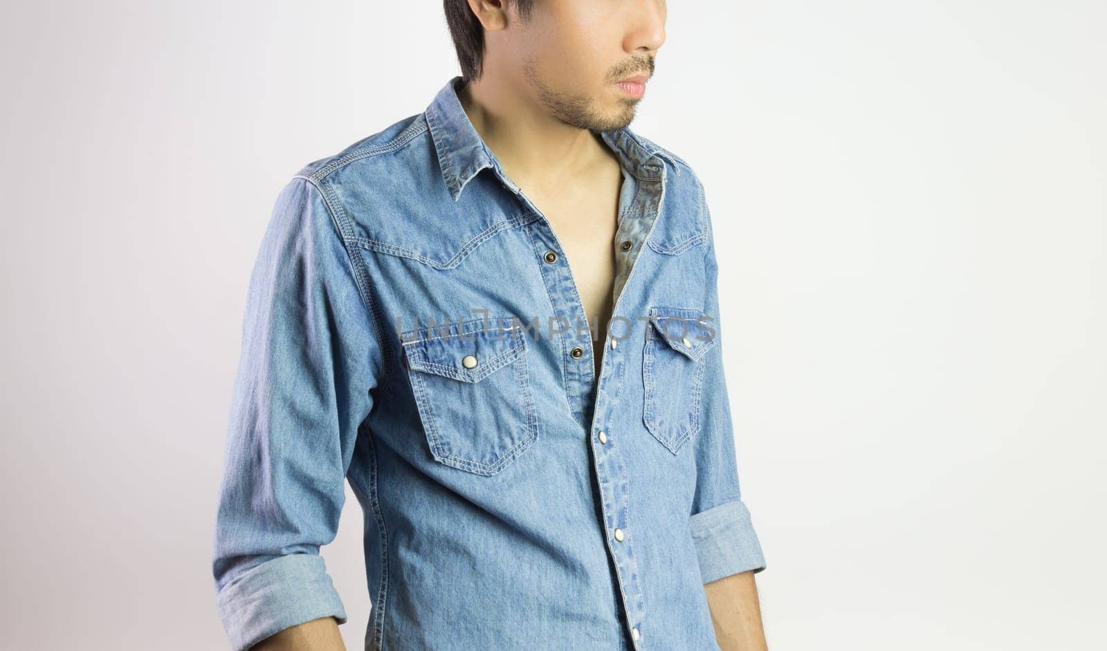 Jeans Shirt or Denim Shirt Man Fashion in 45 degree View. Jeans shirt or denim shirt fashion for men on grey background