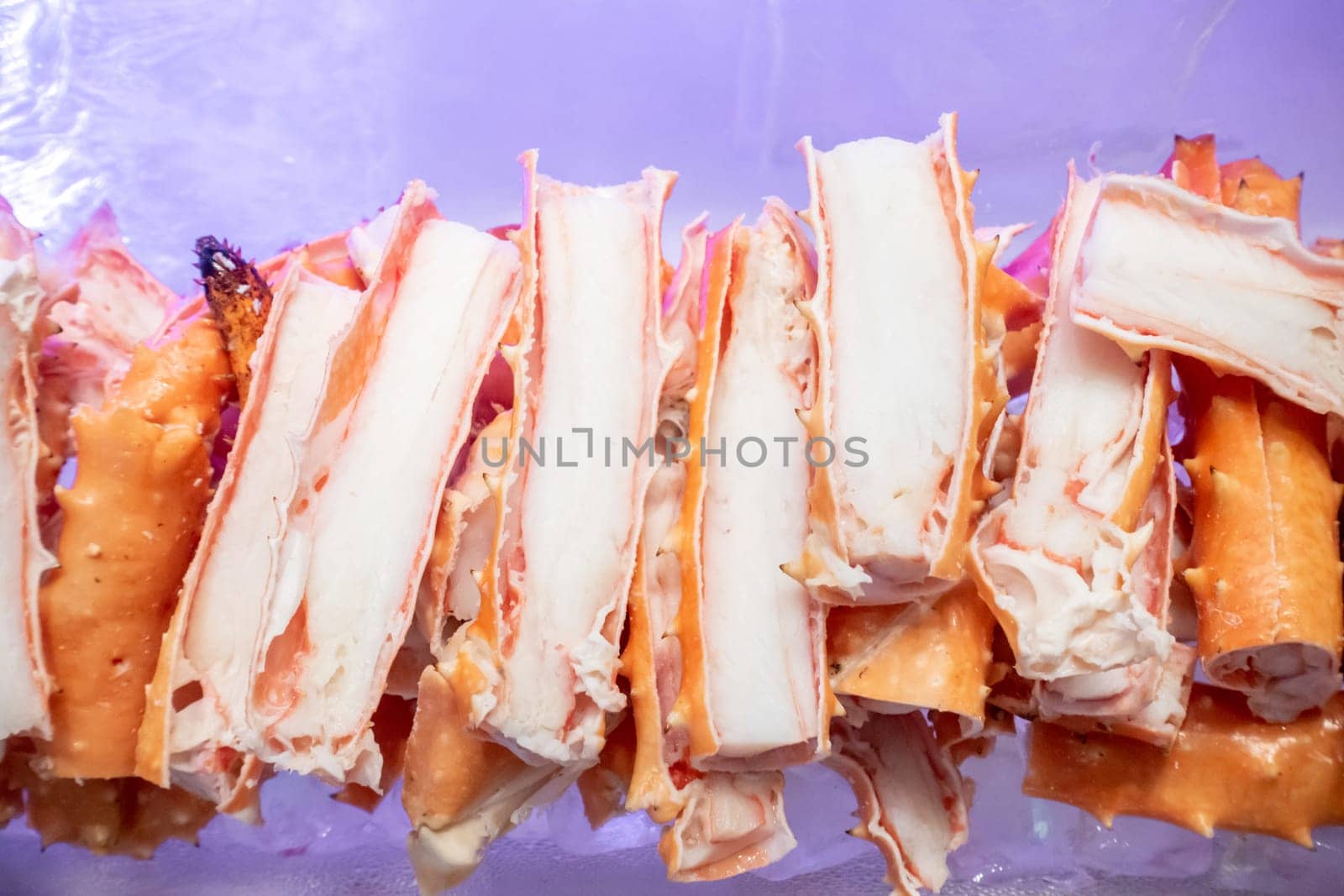 Alaskan King crab in seafood on ice buffet bar