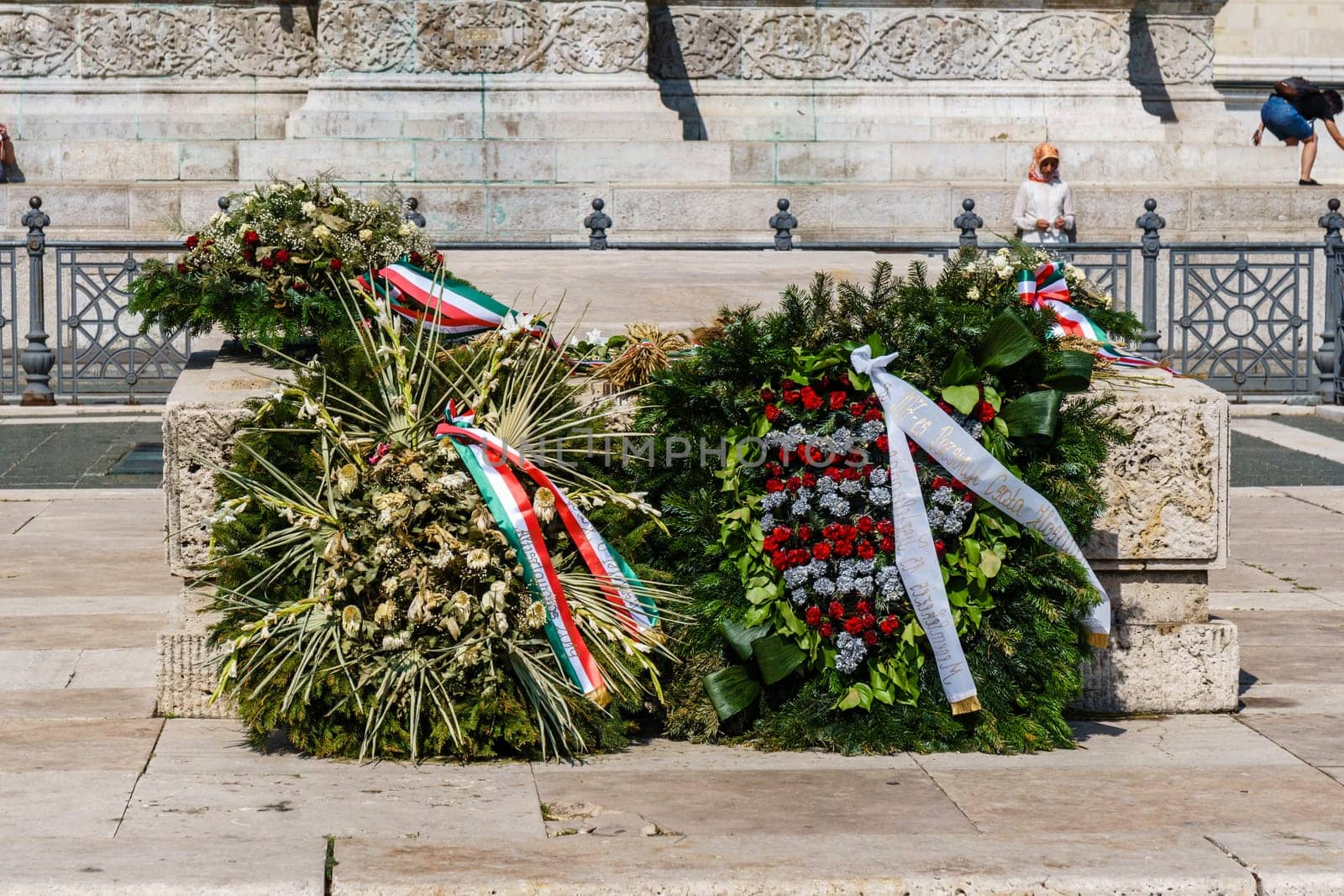 Budapest, Hungary - July 04, 2019: Heroes Square with Millenium Memorial and the horseman Memorial is one of the major squares in Budapest. Panorama with tourists and visitors.