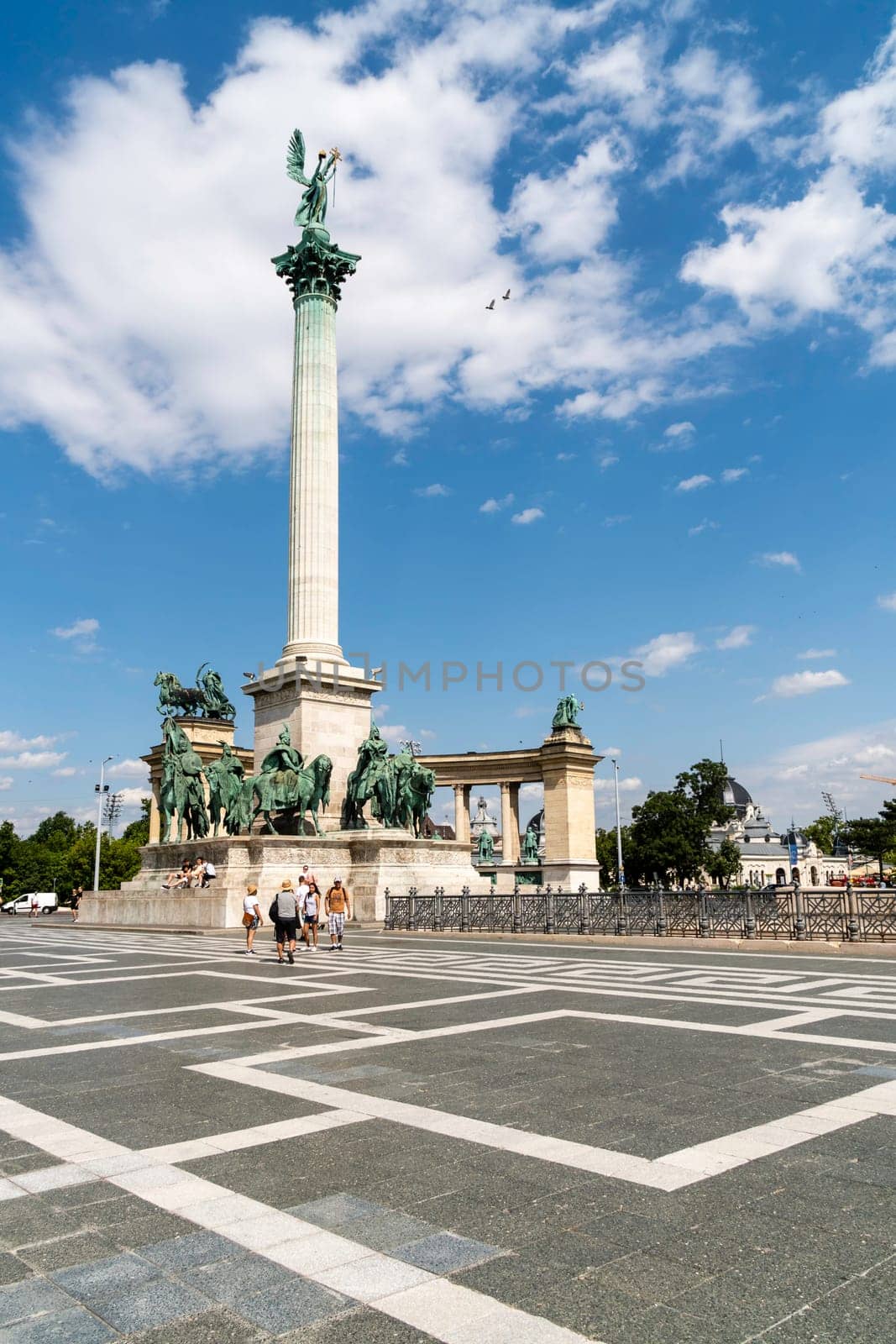 Budapest, Hungary - July 04, 2019: Heroes Square with Millenium Memorial and the horseman Memorial is one of the major squares in Budapest. Panorama with tourists and visitors.