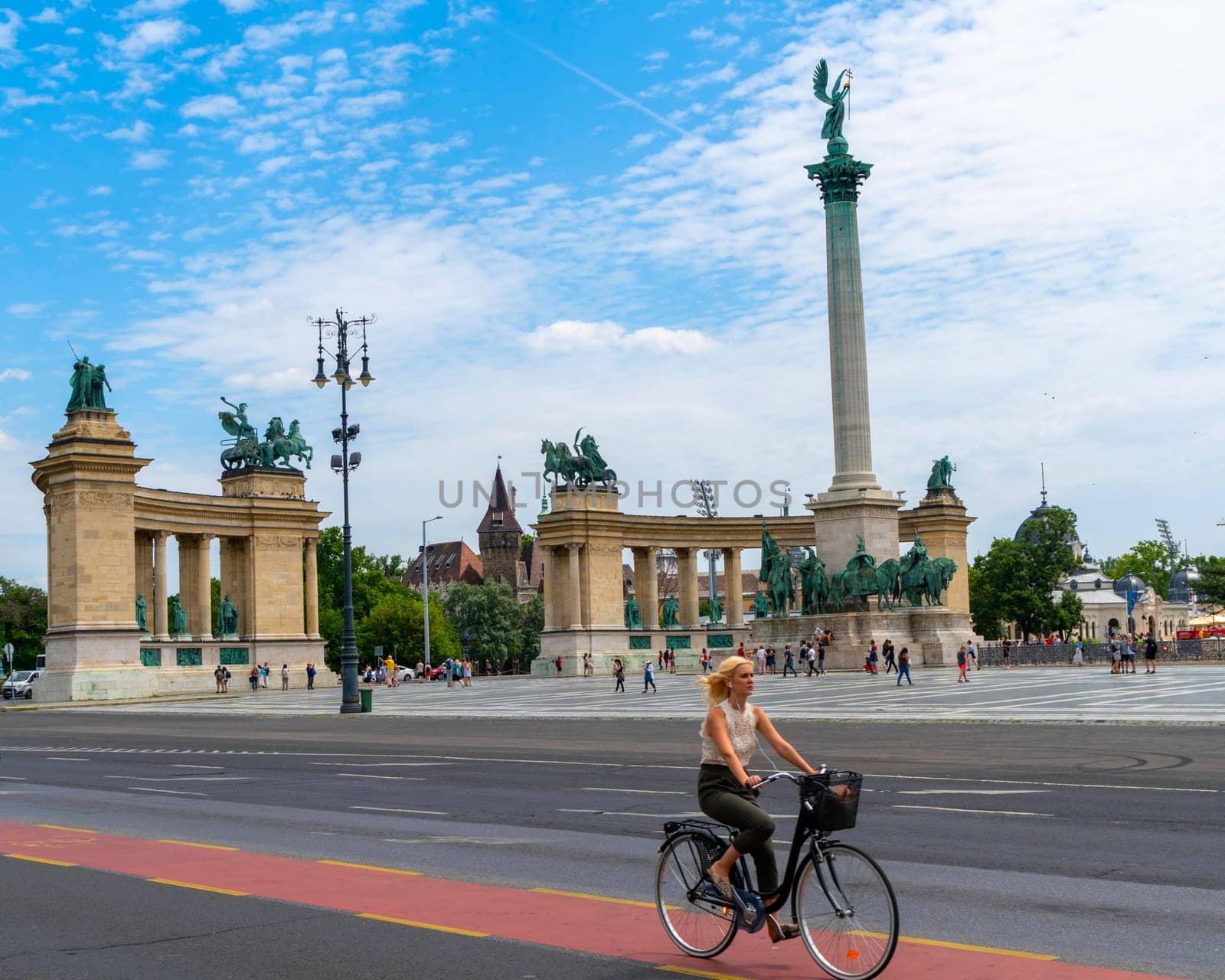 Budapest, Hungary - July 04, 2019: Heroes Square with Millenium Memorial and the horseman Memorial is one of the major squares in Budapest. Panorama with tourists and visitors.