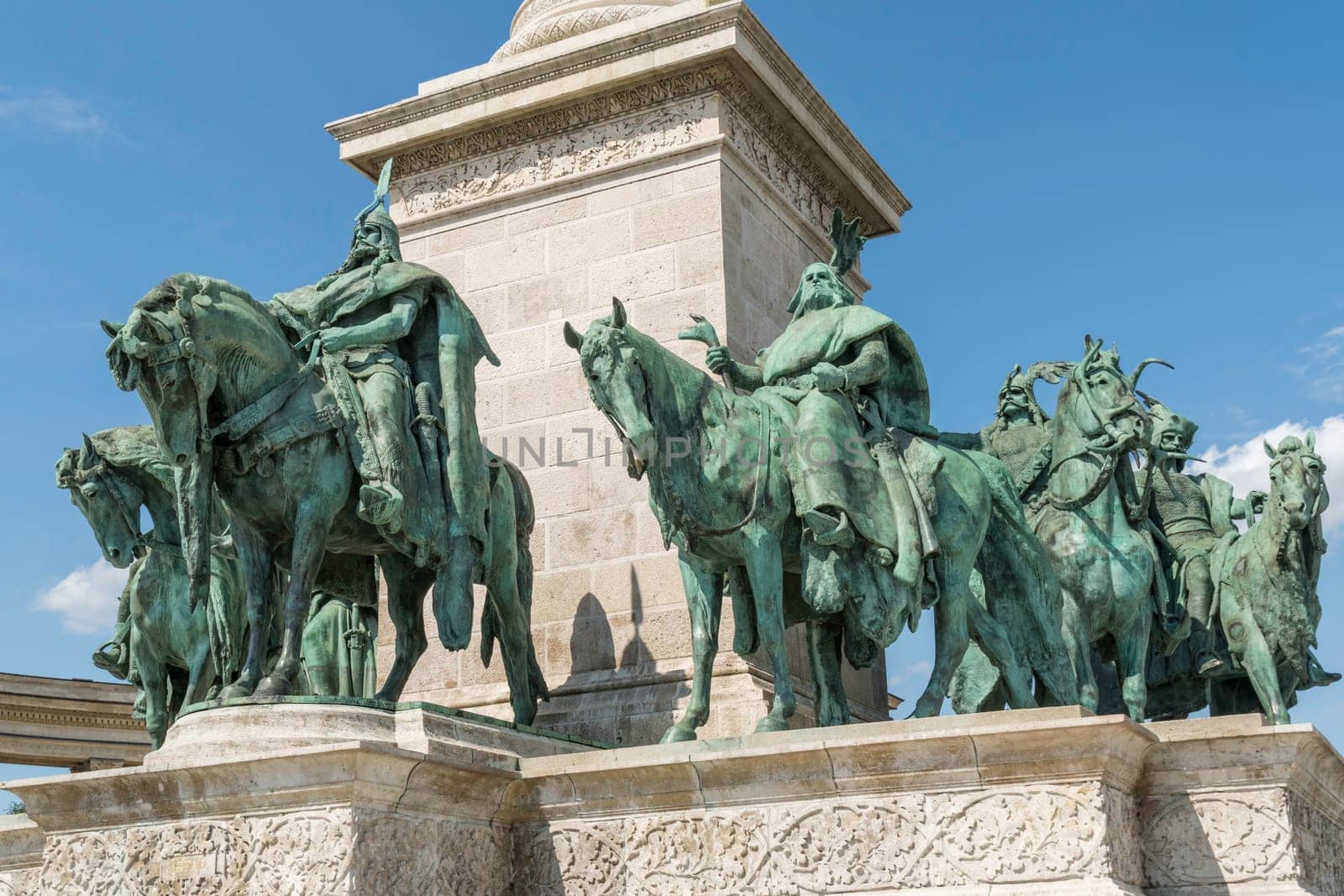 Budapest, Hungary - July 04, 2019: Heroes Square with Millenium Memorial and the horseman Memorial is one of the major squares in Budapest. Panorama with tourists and visitors.
