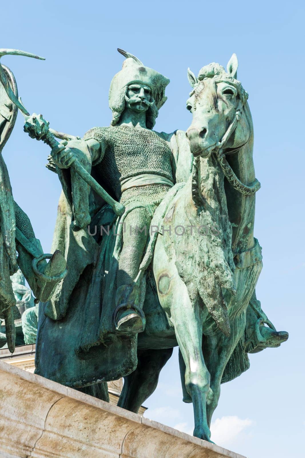 Budapest, Hungary - July 04, 2019: Heroes Square with Millenium Memorial and the horseman Memorial is one of the major squares in Budapest. Panorama with tourists and visitors.