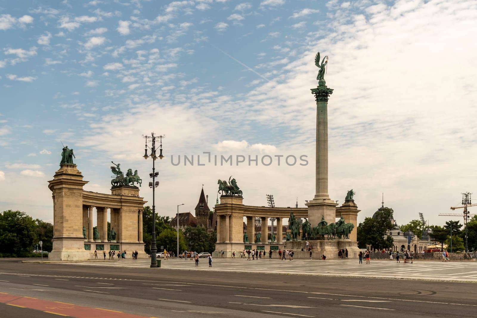 Budapest, Hungary - July 04, 2019: Heroes Square with Millenium Memorial and the horseman Memorial is one of the major squares in Budapest. Panorama with tourists and visitors.