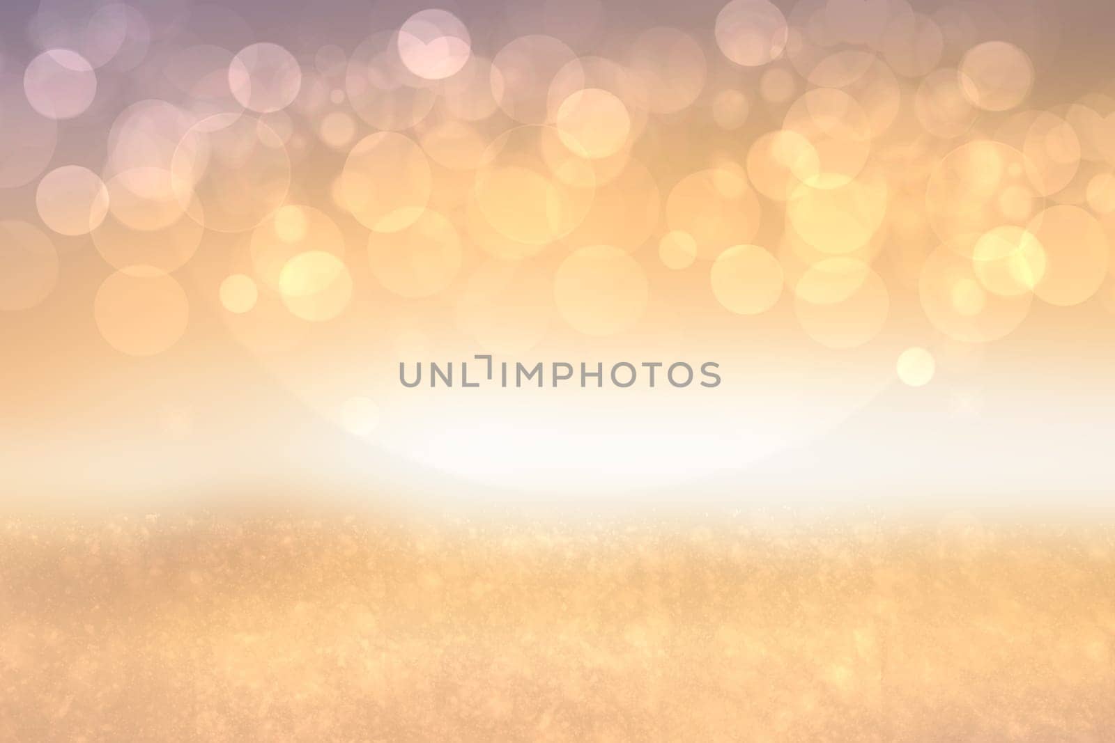 A festive abstract golden pink gradient background texture with glitter defocused sparkle bokeh circles. Card concept for Happy New Year, party invitation, valentine or other holidays.