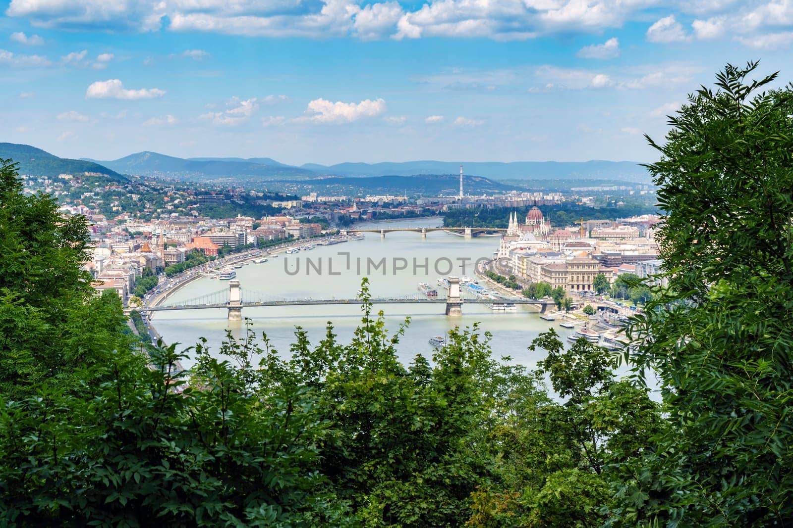 Panorama of Budapest over the Danube river. The bridges destroyed in World War II touch the two parts of the city Buda and Pest. The bridges stand out for their majesty and elegance.