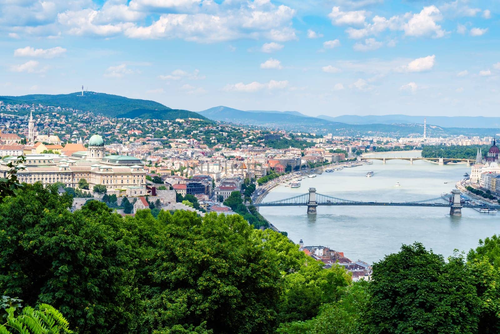 Panorama of Budapest over the Danube river. The bridges destroyed in World War II touch the two parts of the city Buda and Pest. The bridges stand out for their majesty and elegance.