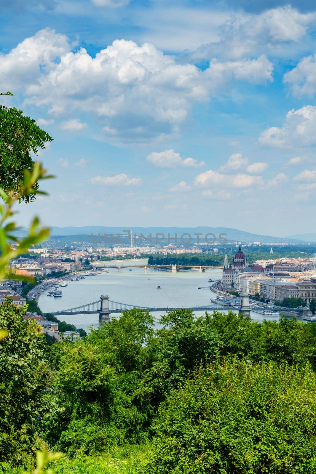 Panorama of Budapest over the Danube river. The bridges destroyed in World War II touch the two parts of the city Buda and Pest. The bridges stand out for their majesty and elegance.