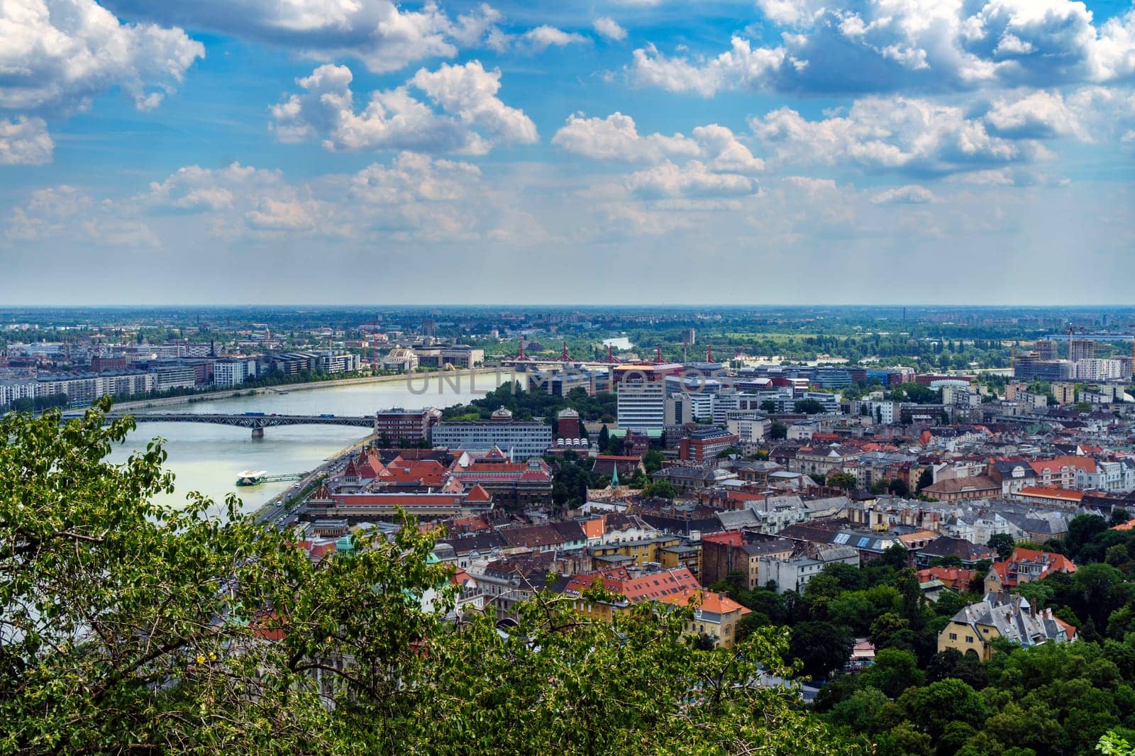 Panorama of Budapest over the Danube river. The bridges destroyed in World War II touch the two parts of the city Buda and Pest. The bridges stand out for their majesty and elegance.