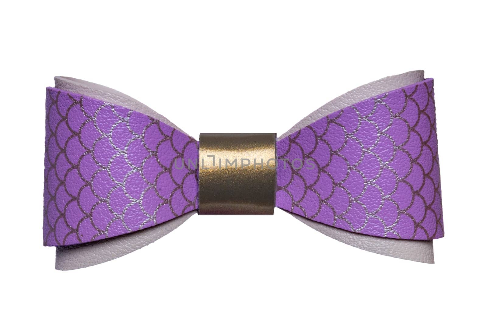 Bow tie isolated. Closeup of decorative elegant purple leather bow tie with gold ribbon isolated on a white background. Decoration design element. Macro.