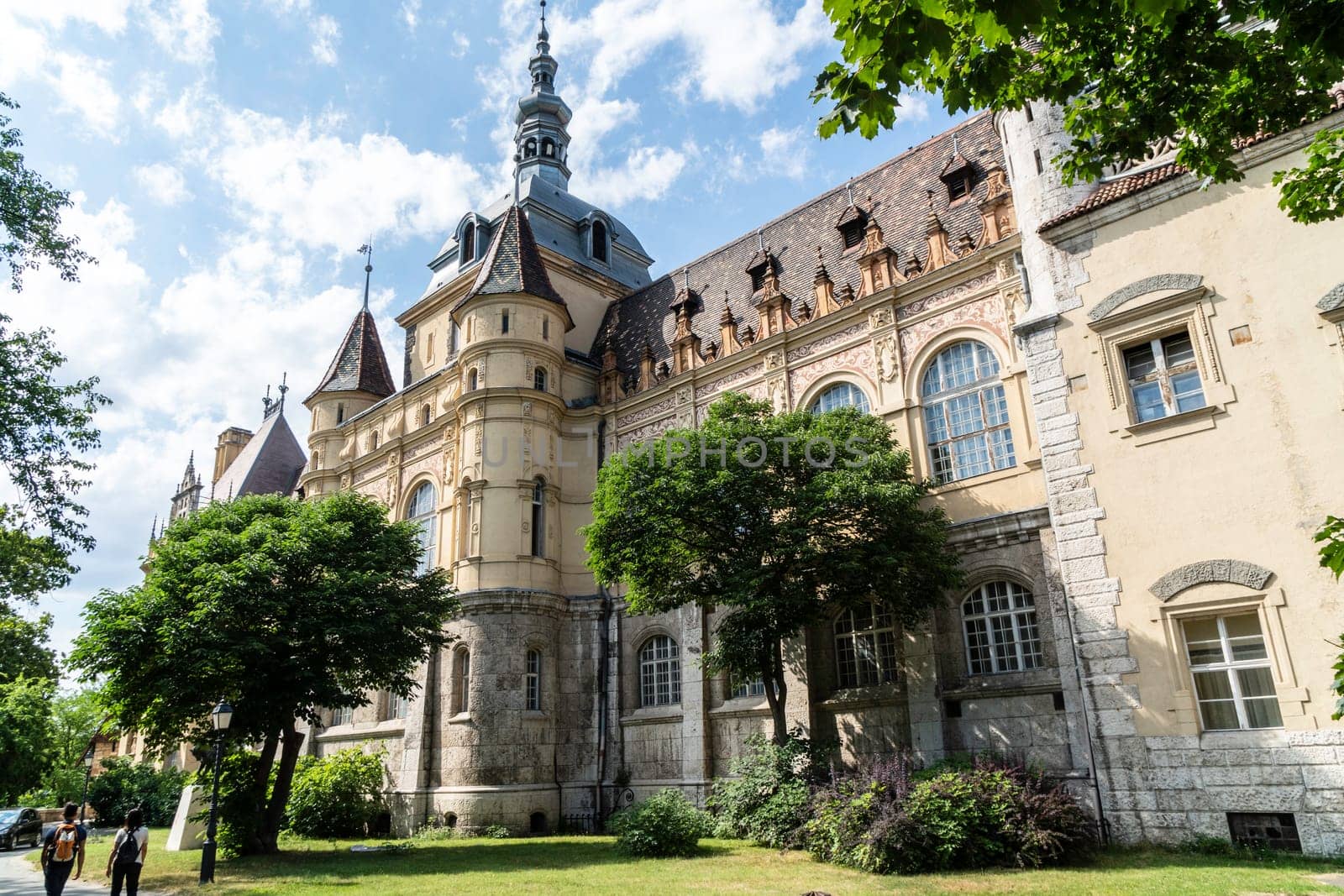 Budapest, Hungary - July 04, 2019: The Vajdahunyad castle, built to celebrate the Millennium, perfectly illustrates the different architectural styles that characterize Hungary. It is partly inspired by the castle of Honedoara (Transylvania, Romania).