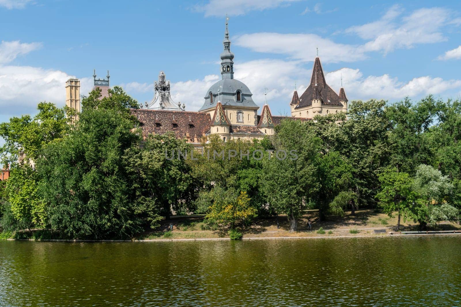 Budapest, Hungary - July 04, 2019: The Vajdahunyad castle, built to celebrate the Millennium, perfectly illustrates the different architectural styles that characterize Hungary. It is partly inspired by the castle of Honedoara (Transylvania, Romania).