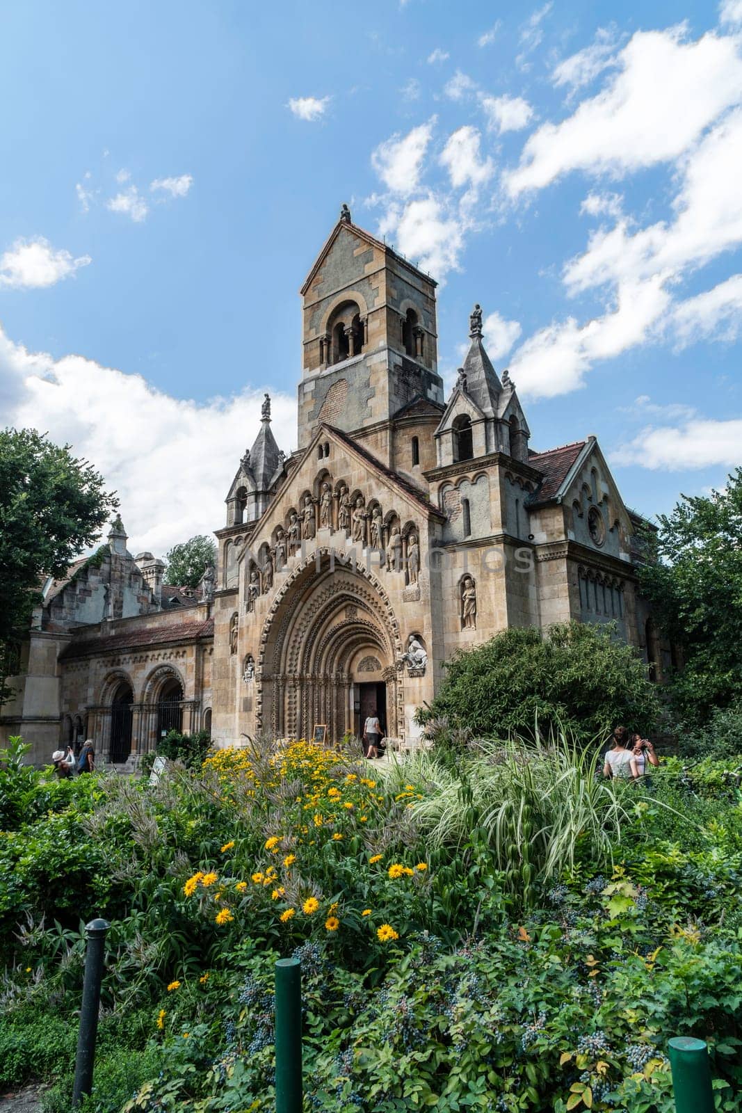 Budapest, Hungary - July 04, 2019: The Vajdahunyad castle, built to celebrate the Millennium, perfectly illustrates the different architectural styles that characterize Hungary. It is partly inspired by the castle of Honedoara (Transylvania, Romania).