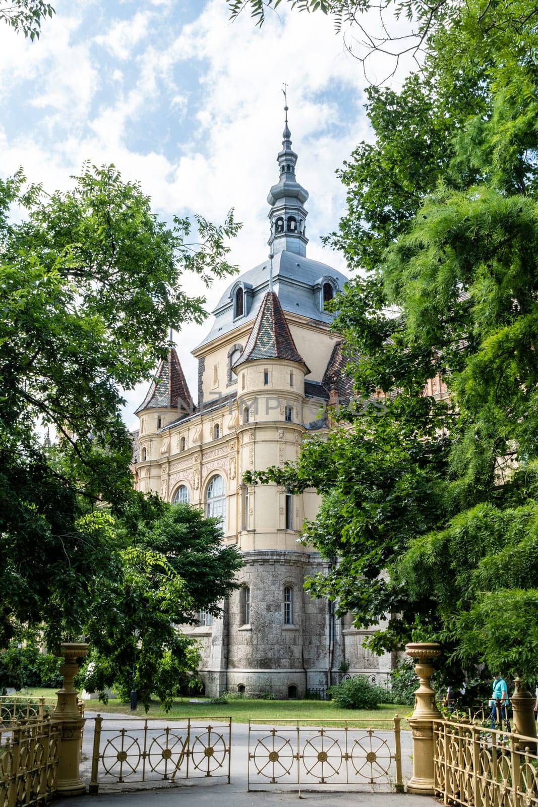 Budapest, Hungary - July 04, 2019: The Vajdahunyad castle, built to celebrate the Millennium, perfectly illustrates the different architectural styles that characterize Hungary. It is partly inspired by the castle of Honedoara (Transylvania, Romania).