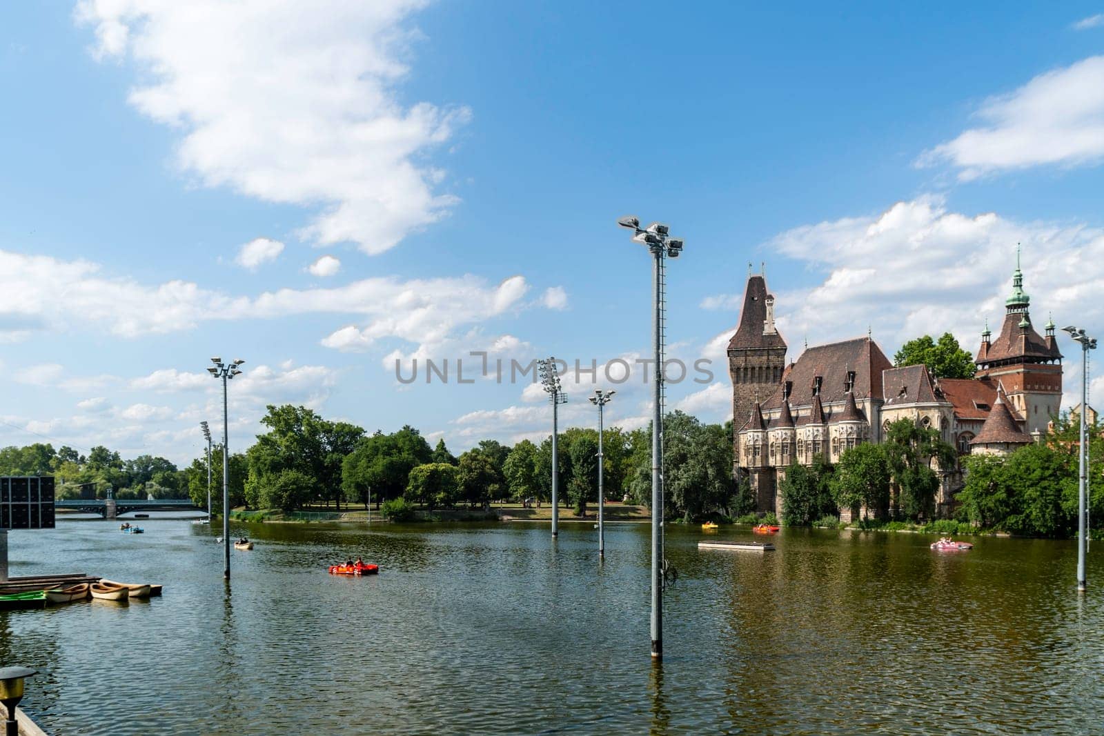 Budapest, Hungary - July 04, 2019: The Vajdahunyad castle, built to celebrate the Millennium, perfectly illustrates the different architectural styles that characterize Hungary. It is partly inspired by the castle of Honedoara (Transylvania, Romania).