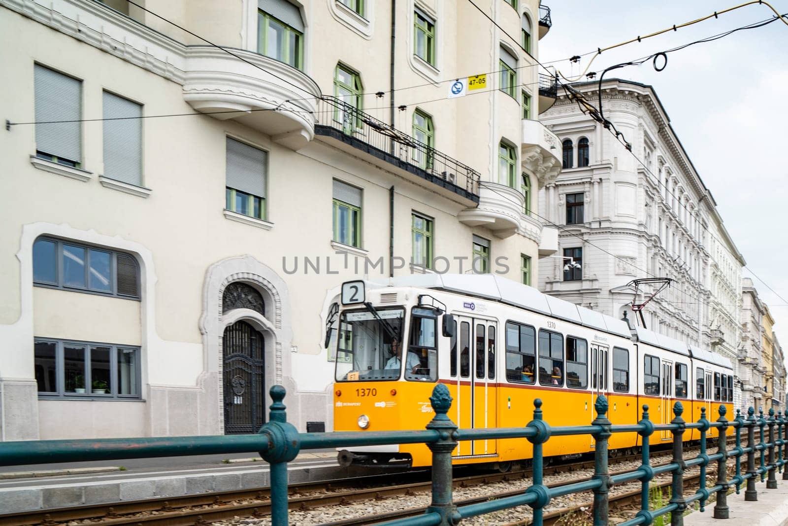 Budapest, Hungary _ July 05, 2019: The Budapest tram network is part of the mass transit system of Budapest, the capital of Hungary. The tram lines carrying nearly 100 million passengers and tourists. Characteristic and very beautiful to see. Budapest, Hungary.