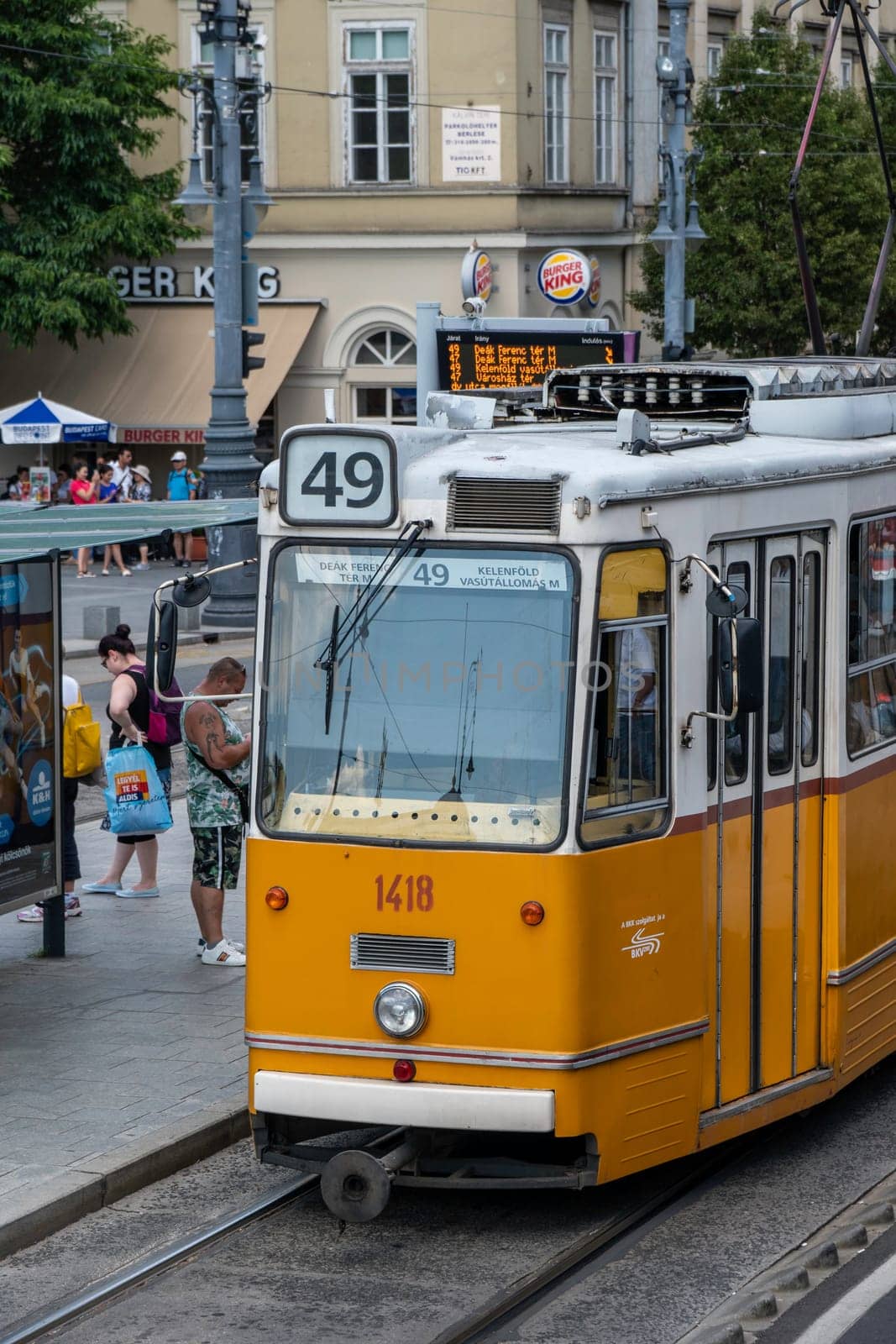 Budapest, Hungary _ July 05, 2019: The Budapest tram network is part of the mass transit system of Budapest, the capital of Hungary. The tram lines carrying nearly 100 million passengers and tourists. Characteristic and very beautiful to see. Budapest, Hungary.