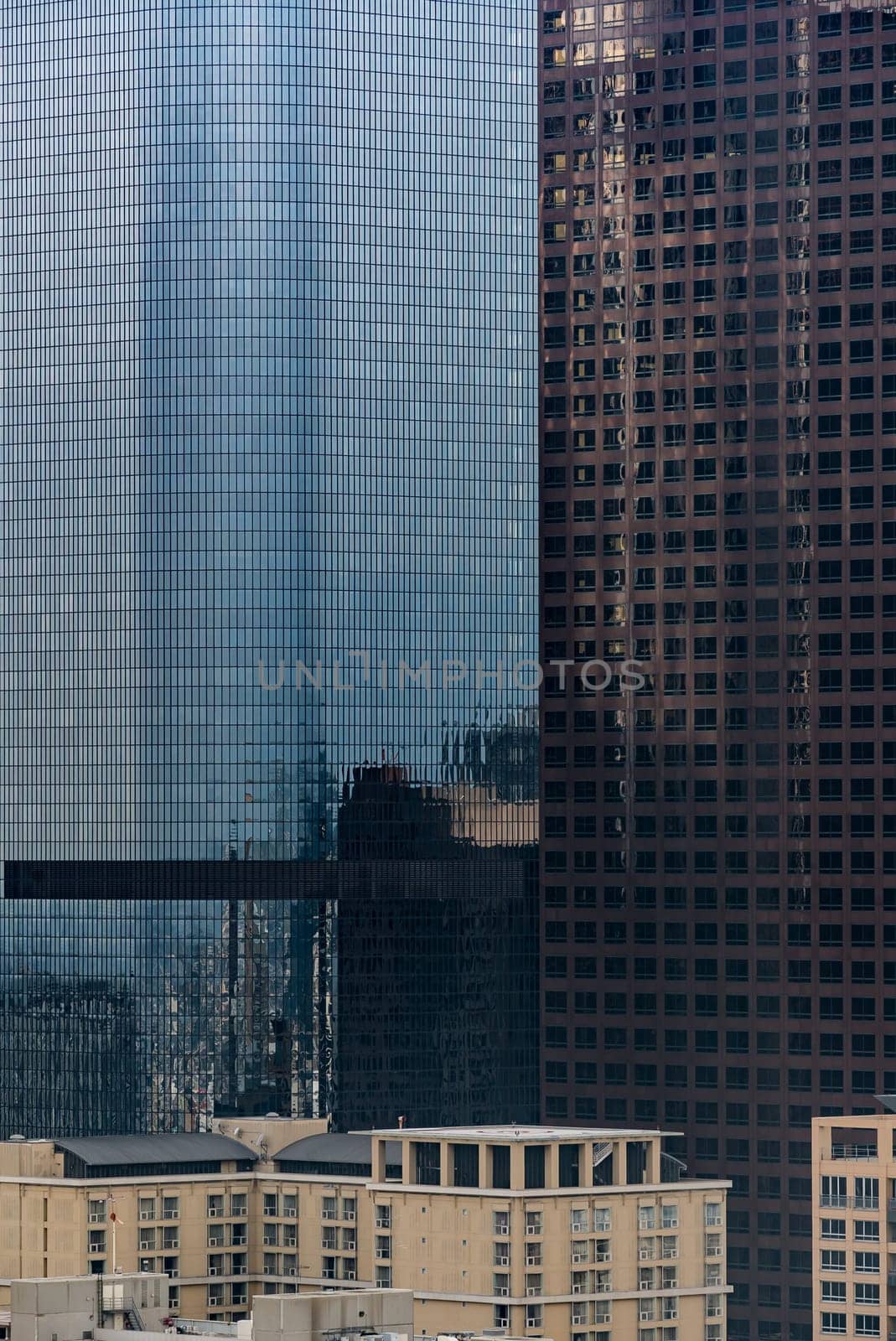 Urban abstract - window facade of business center office building with reflections and colours. Los Angeles CA USA.