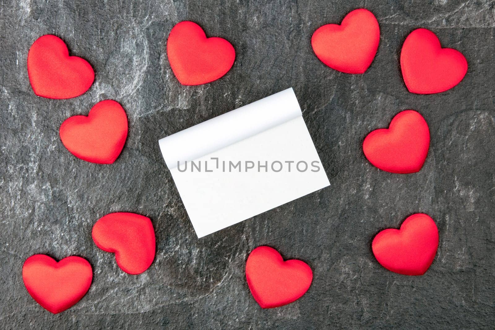 Little velvet hearts with a blank calendar. Concept romantic.