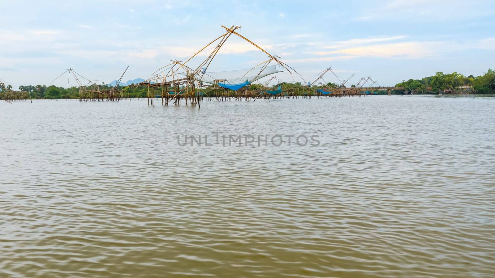 Yok Yor, is a fishing with local wisdom. Tool for capture aquatic animals of native people made of bamboo and net are trap rural lifestyle at Pakpra canal, Baan Pak Pra, Phatthalung, Thailand