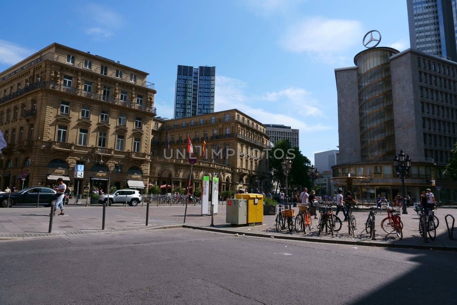 Frankfurt, Germany - July 06, 2019: The Imperial Square in the city center with the Hotel Steigenberger Frankfurter Hof as well as shops and commercial buildings on 06 July 2019 in Frankfurt...