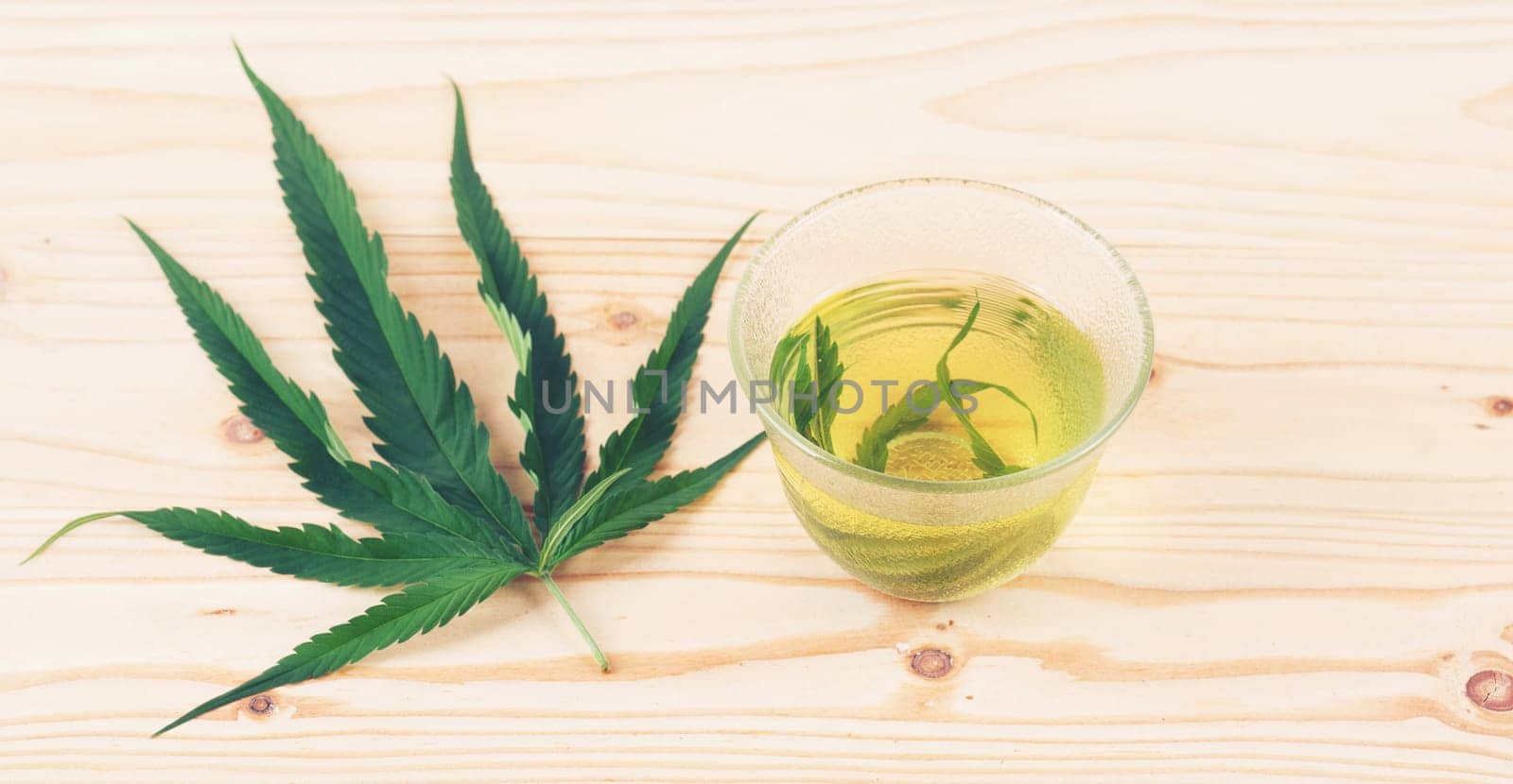 marijuana herbal tea served in glass teacup