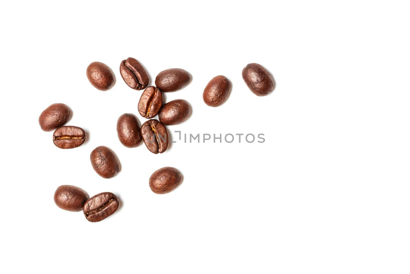 A spread coffee beans isolated on white background and copy space