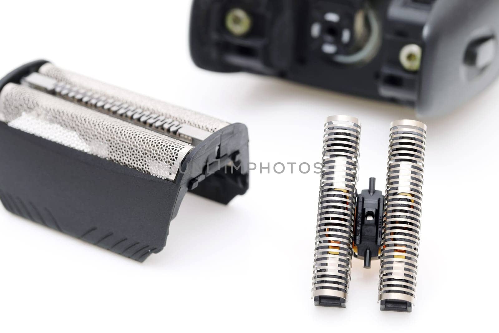 Blade cutter head and shaver replacement foil for electric razor on white background