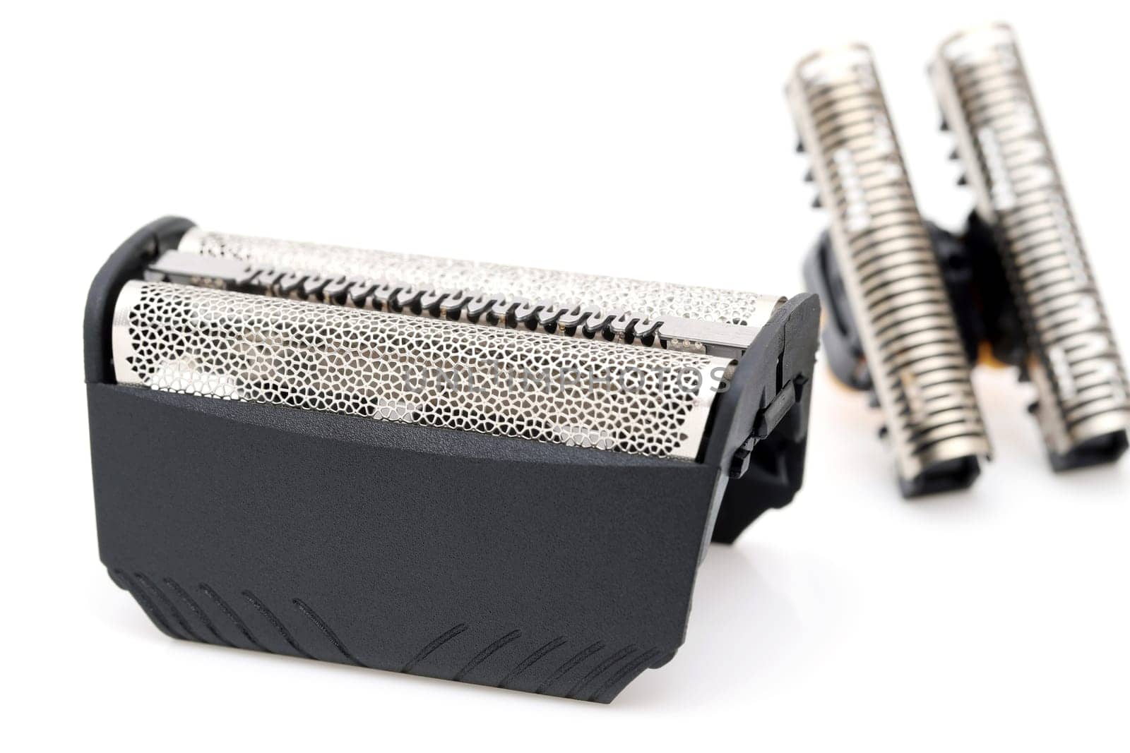 Blade cutter head and shaver replacement foil for electric razor on white background