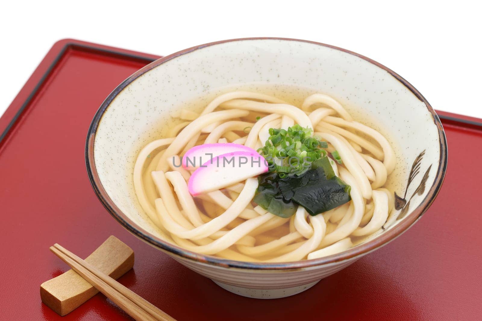 Japanese Kake udon noodles in a ceramic bowl