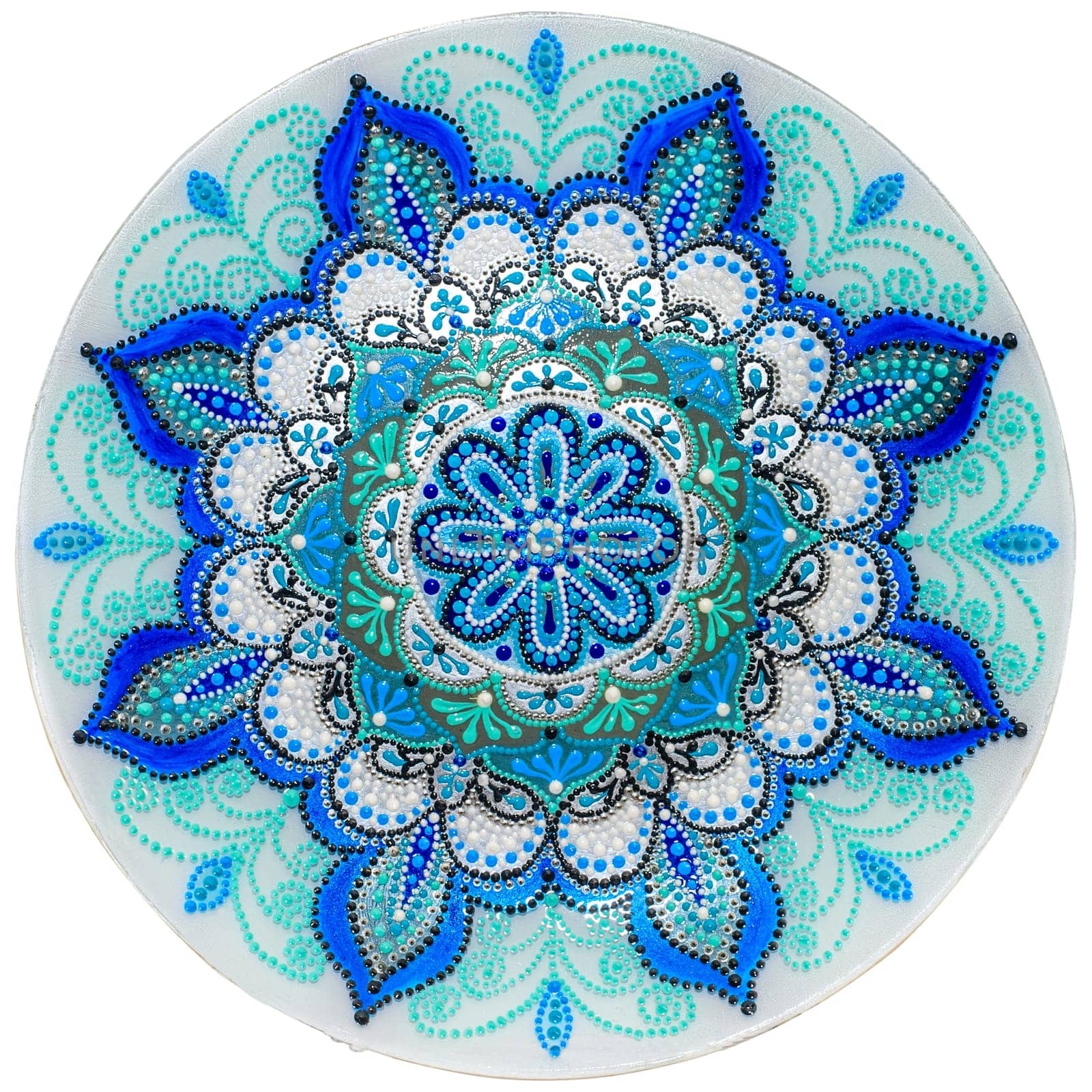 Decorative ceramic dish painted with hands. Art, handmade. Pattern mandala
