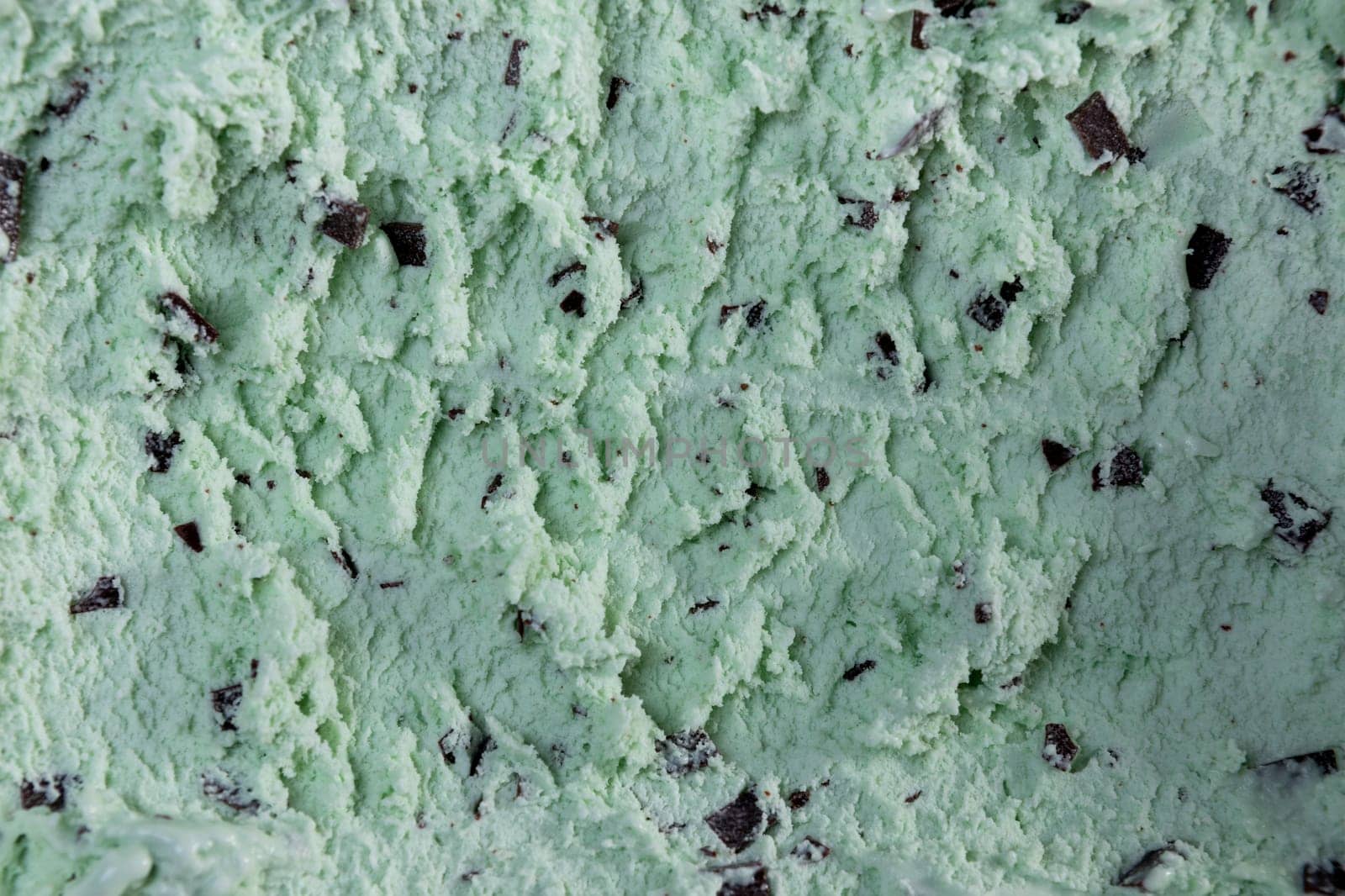 Top view of mint flavour ice cream with chocolate flakes in box