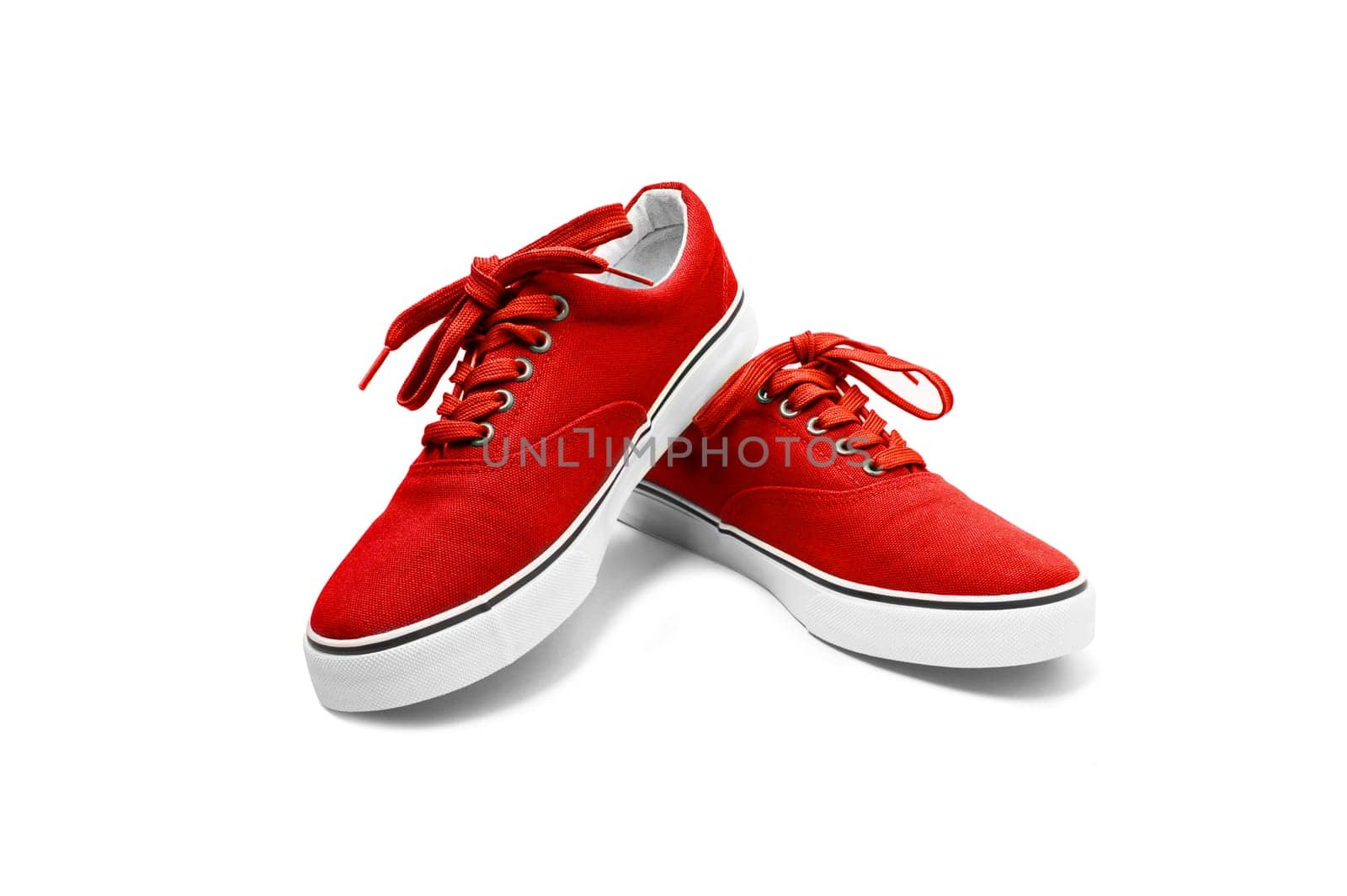 A pair of Red canvas shoes isolated on white background with clipping path
