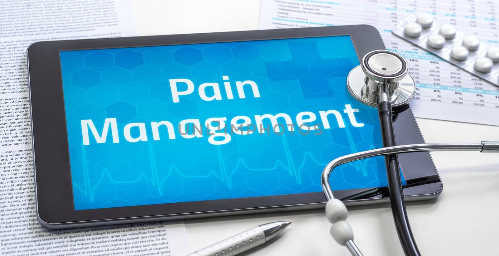 The word Pain Management on the display of a tablet