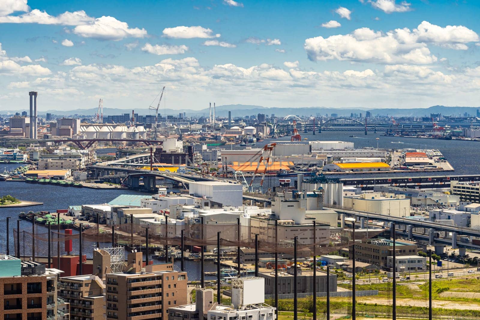 Aerial view kobe cityscape and Port industrial zone in Kobe Hyogo Kansai Japan using for import export shipping and global business background