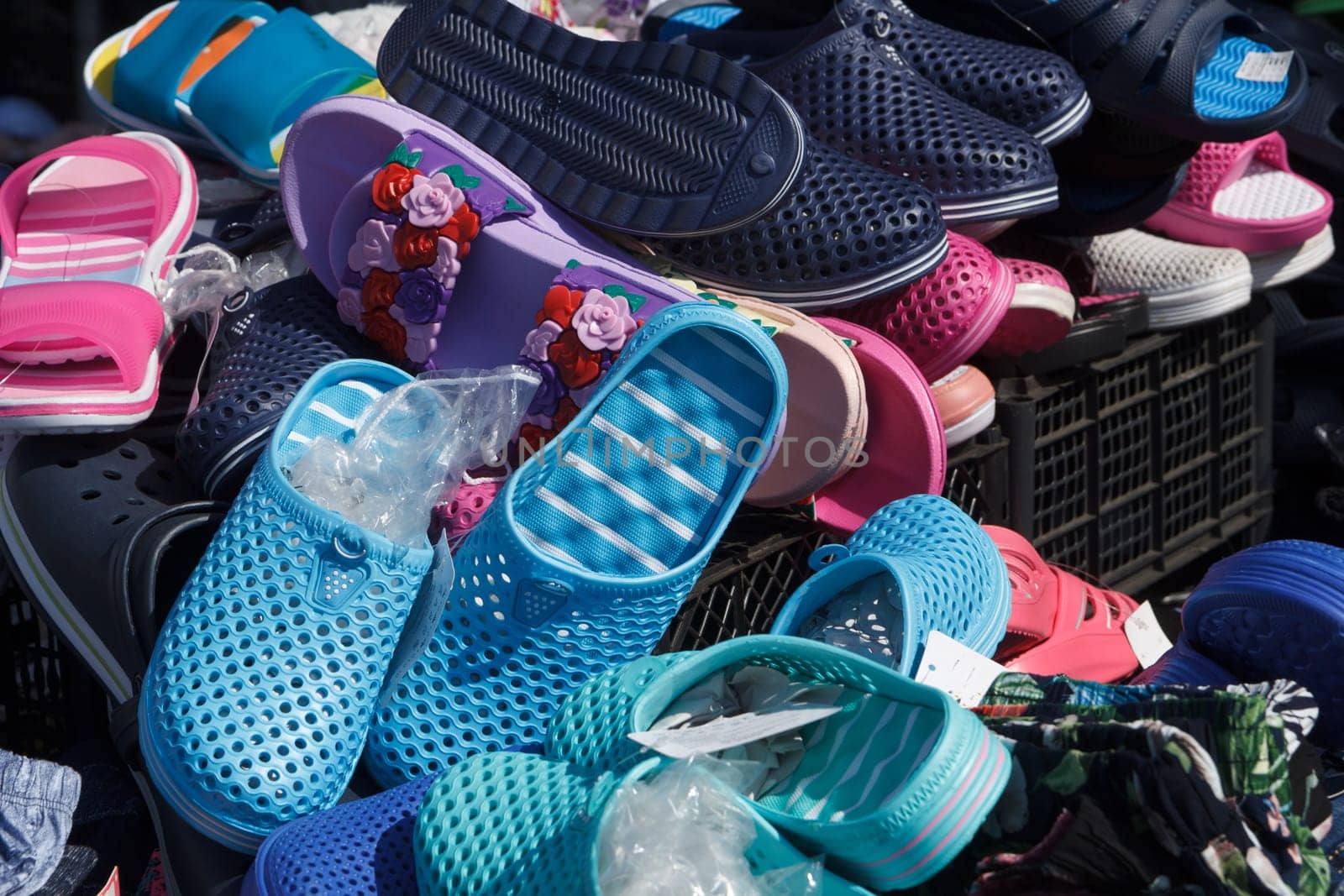 Pile of shoes. Closedup of soes on sale in a flea market.