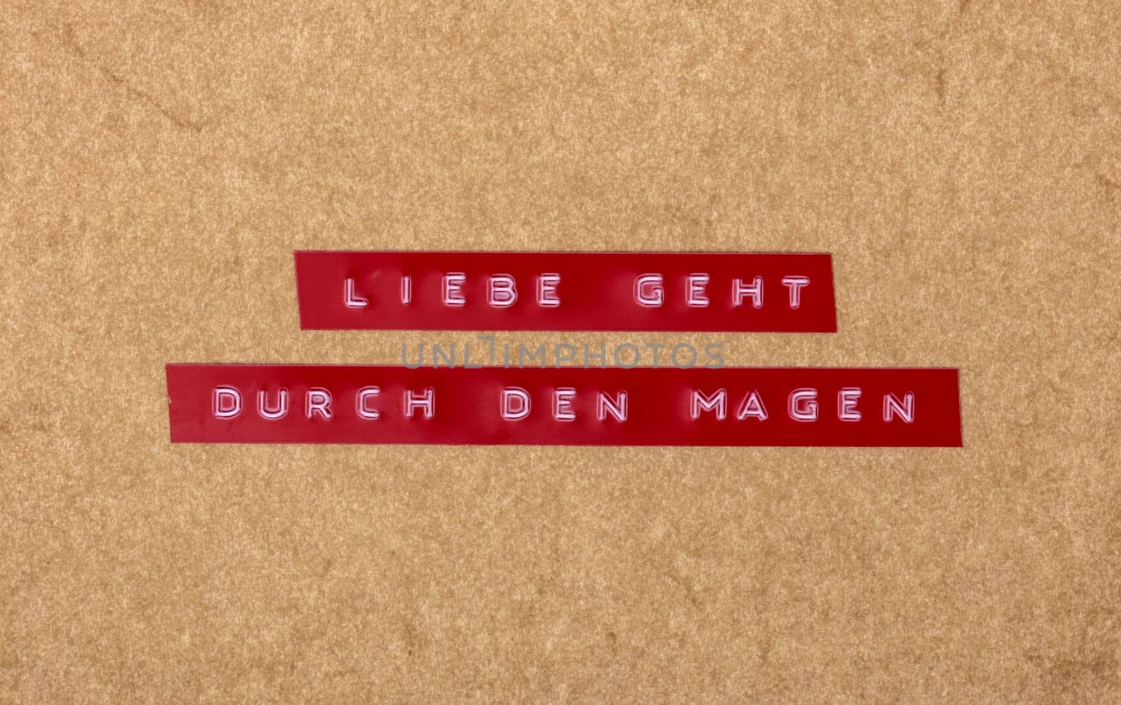 Liebe geht durch den Magen in german language means The way to a man's heart is through his stomach.