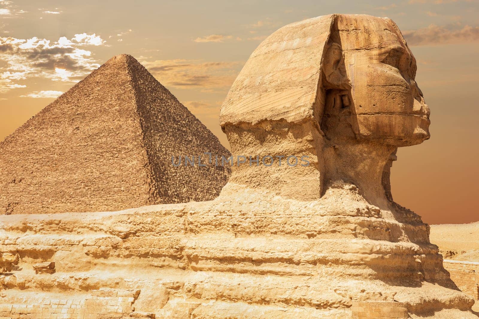 The Sphinx and the Pyramid of Cheops, close view, Giza, Egypt.