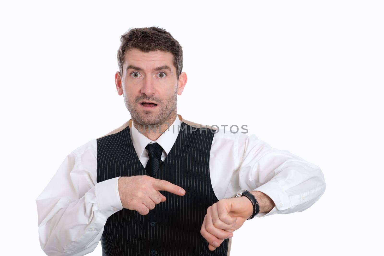 businessman is pointing on his watch