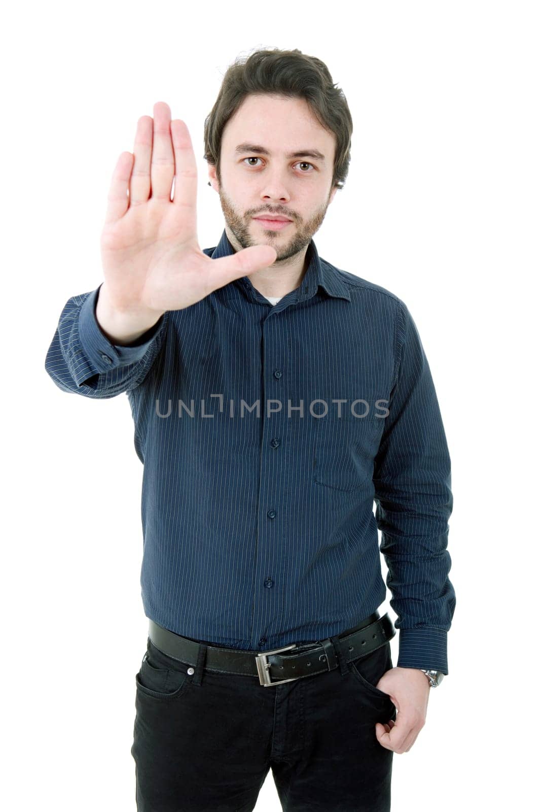 young man making stop with his hand, isolated