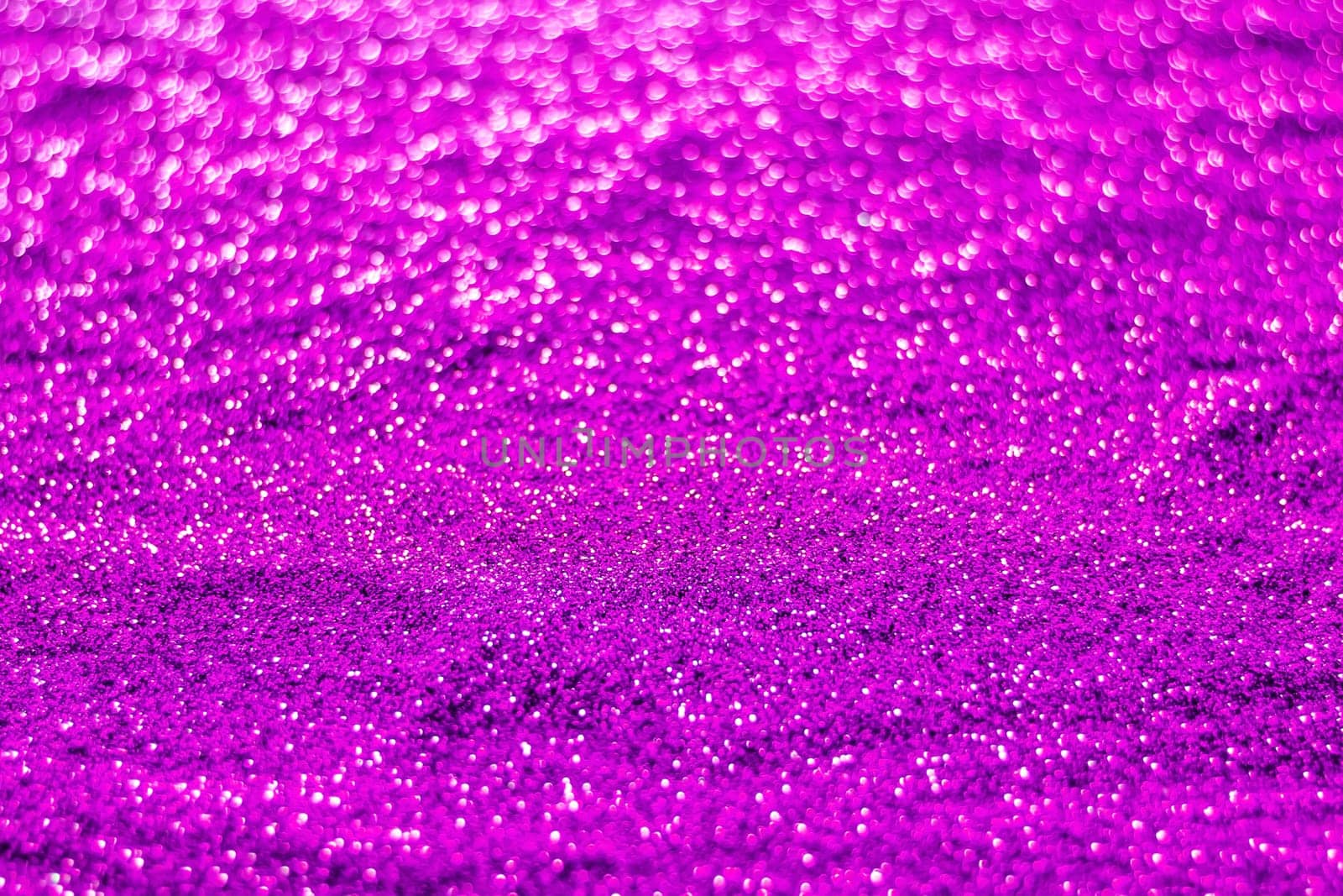 Glitter light abstract purple bokeh christmas light blurred background