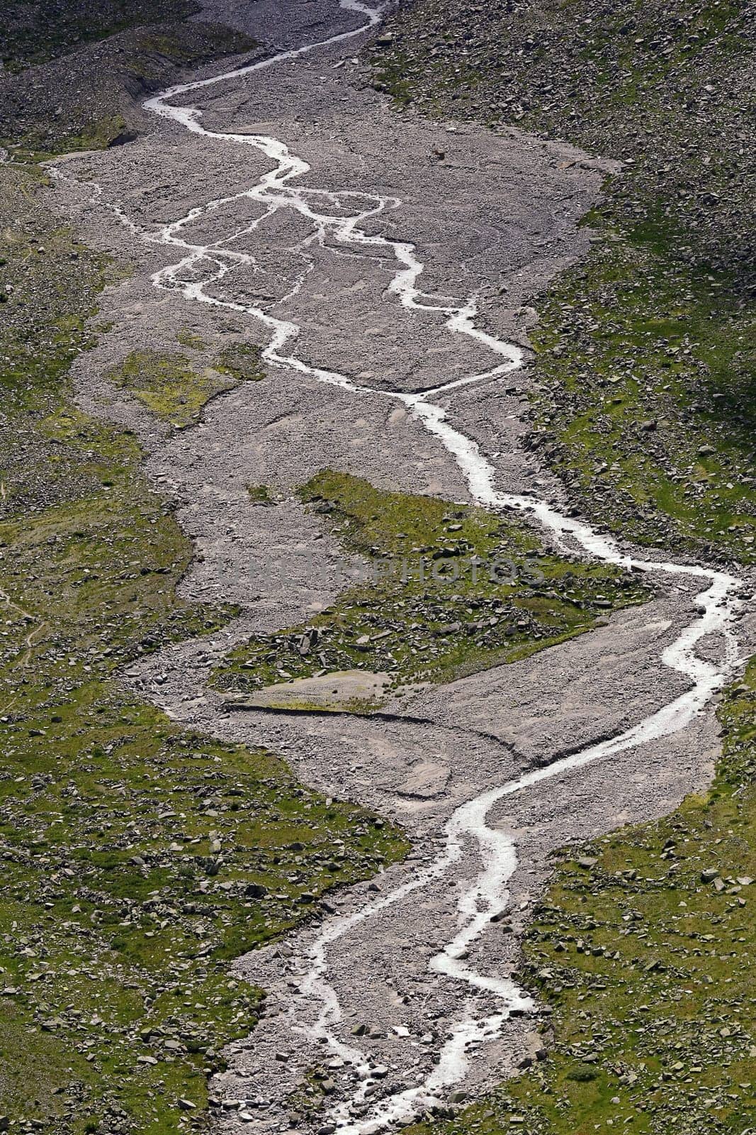 Ödenwinkelkees with glacier stream in the Hohe Tauern